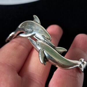 Artisan Sterling Silver Cuff Bracelet With Intricate Double Dolphin Design